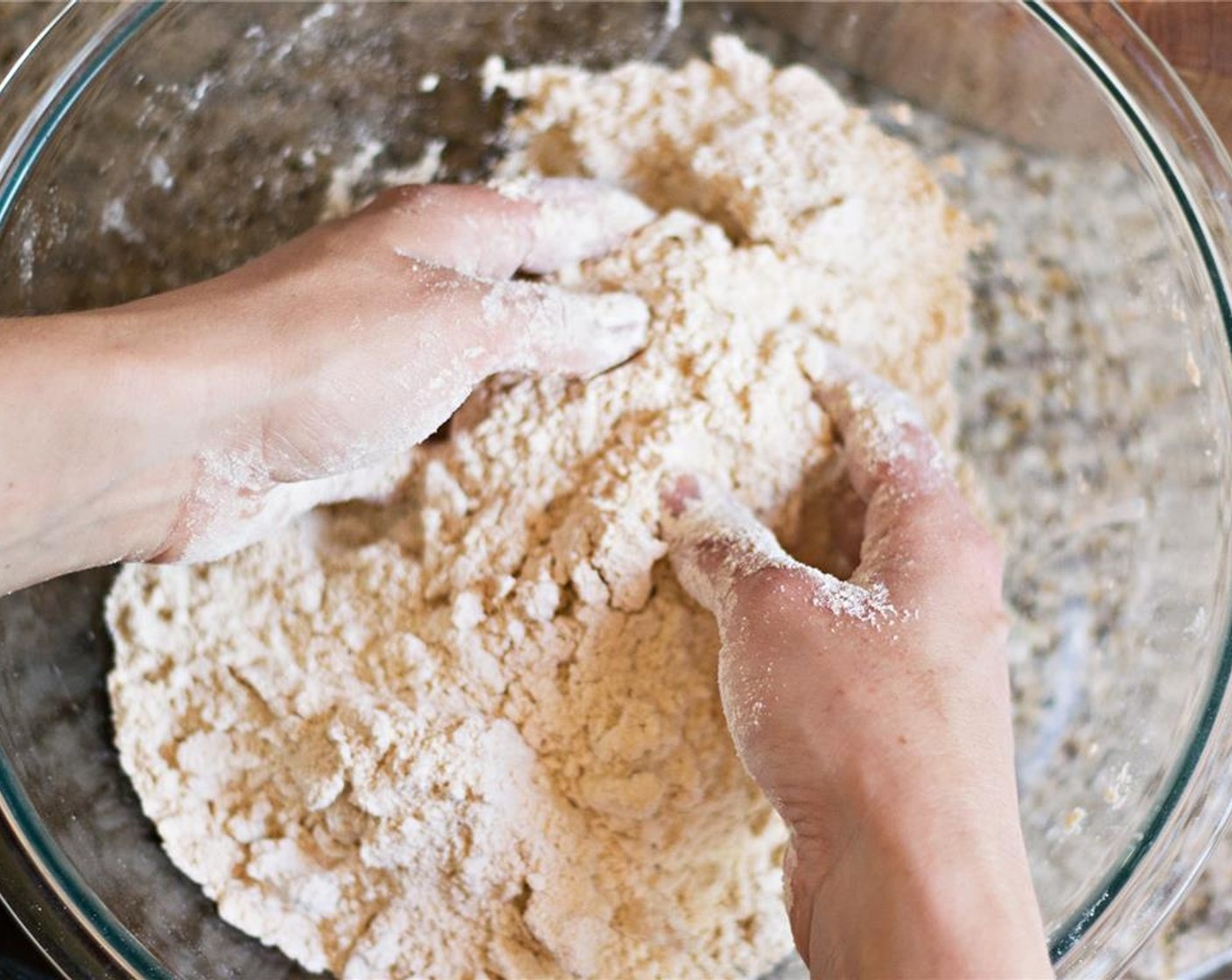 step 6 Using your hands, gently squish the butter into the flour until everything is incorporated but not smooth. The chunks of butter will create flaky scones.