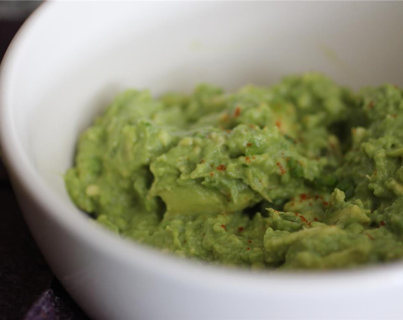 step 5 Using a fork, or potato masher if you’re fancy, start mashing the avocados and stirring until it’s broken down a bit and the jalapeño and lime juice is incorporated. Add Cayenne Pepper (1/4 tsp) and a little more Salt (to taste).