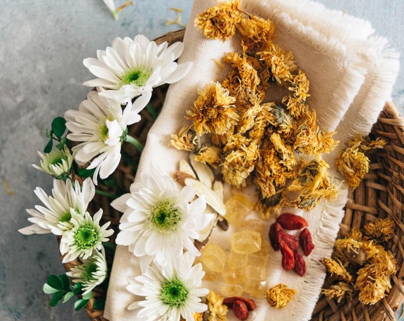 step 1 Place Dried Baby Chrysanthemums (2 cups), Goji Berries (1/4 cup), Licorice Root (1/4 cup), American Ginseng (2 Tbsp) in a colander and rinse under running water. Transfer to a medium-size pot and add Water (10 cups).