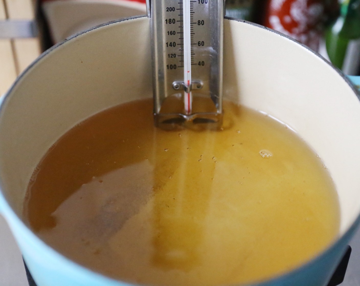 step 14 Begin heating up the Vegetable Oil (as needed) in a medium-size dutch oven fitted with a thermometer on the side. Allow it to come up to around 350 degrees F (180 degrees C).