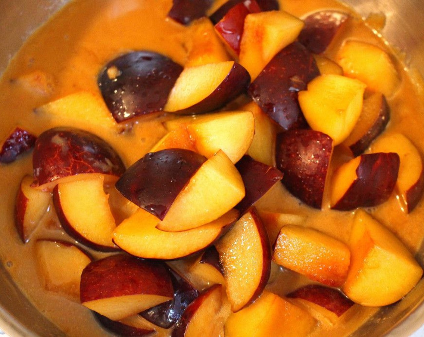 step 10 Add the plums and simmer until they are heated through, about 2 minutes.