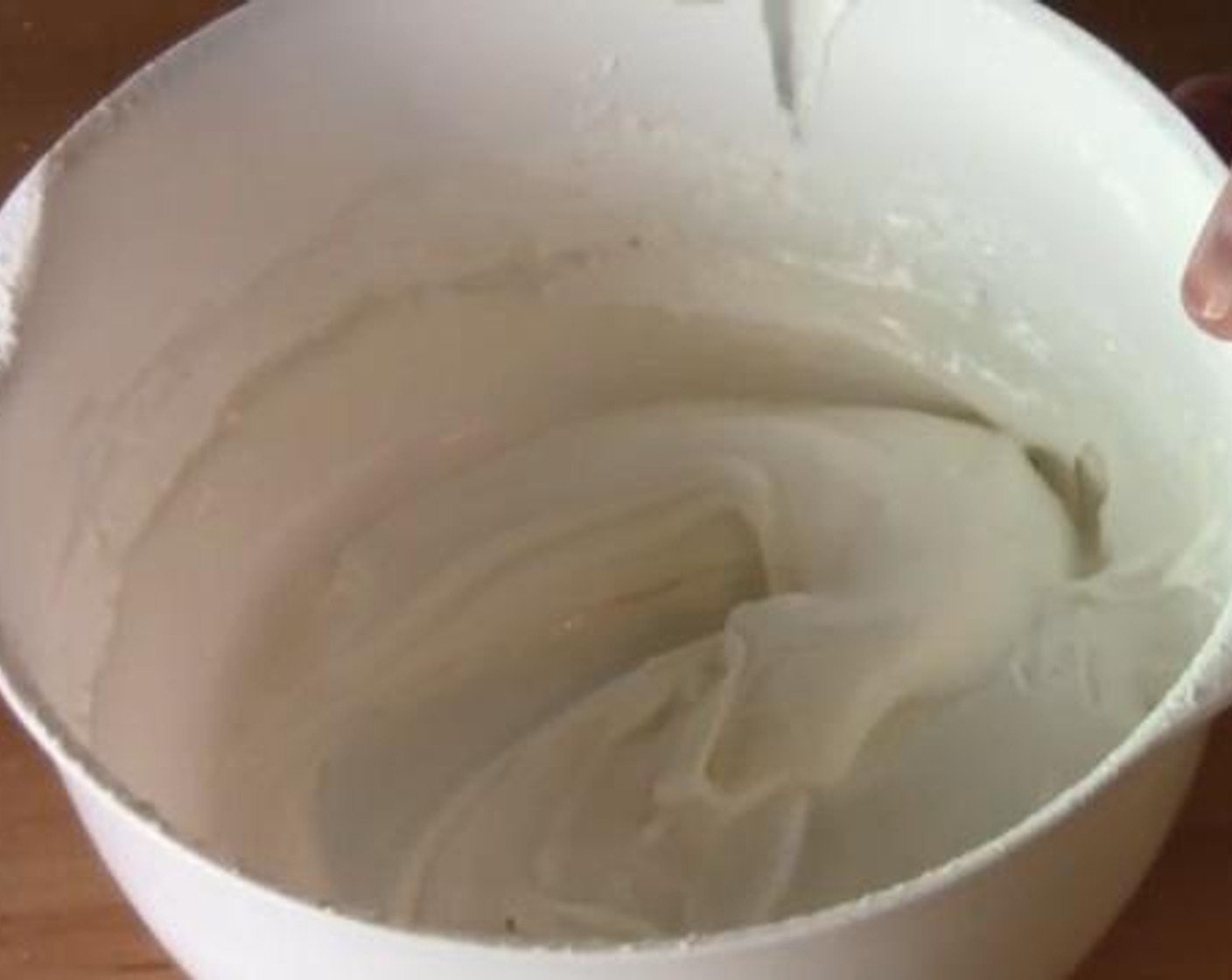 step 1 In a mixing bowl, beat the Eggland's Best Classic Eggs (2) with an electric mixer. Add in, and mix half of the Powdered Confectioners Sugar (3 cups). Then, pour in the juice from Lemon (1) and add the remaining icing sugar, and combine everything well.