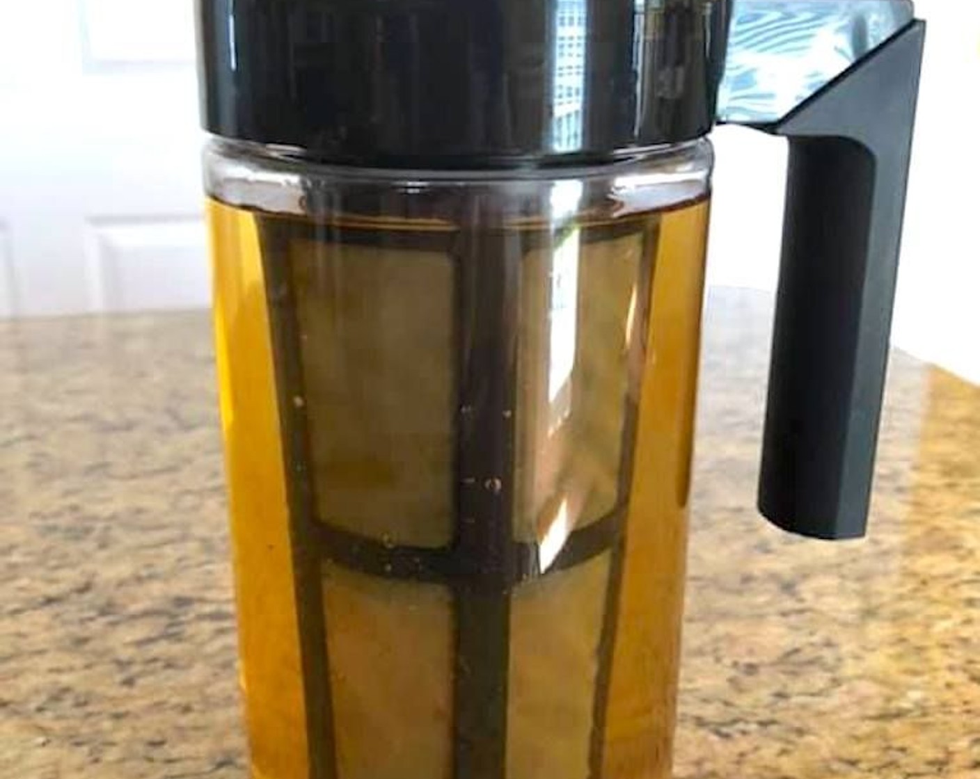 step 1 Add the Ground Coffee (1 cup) to the filter of your cold brew pitcher or french press. Then fill the pitcher with Filtered Water (4 cups) and put the filter in it, sealing the pitcher with the lid. Let it sit in the refrigerator for at least 12 hours to brew.