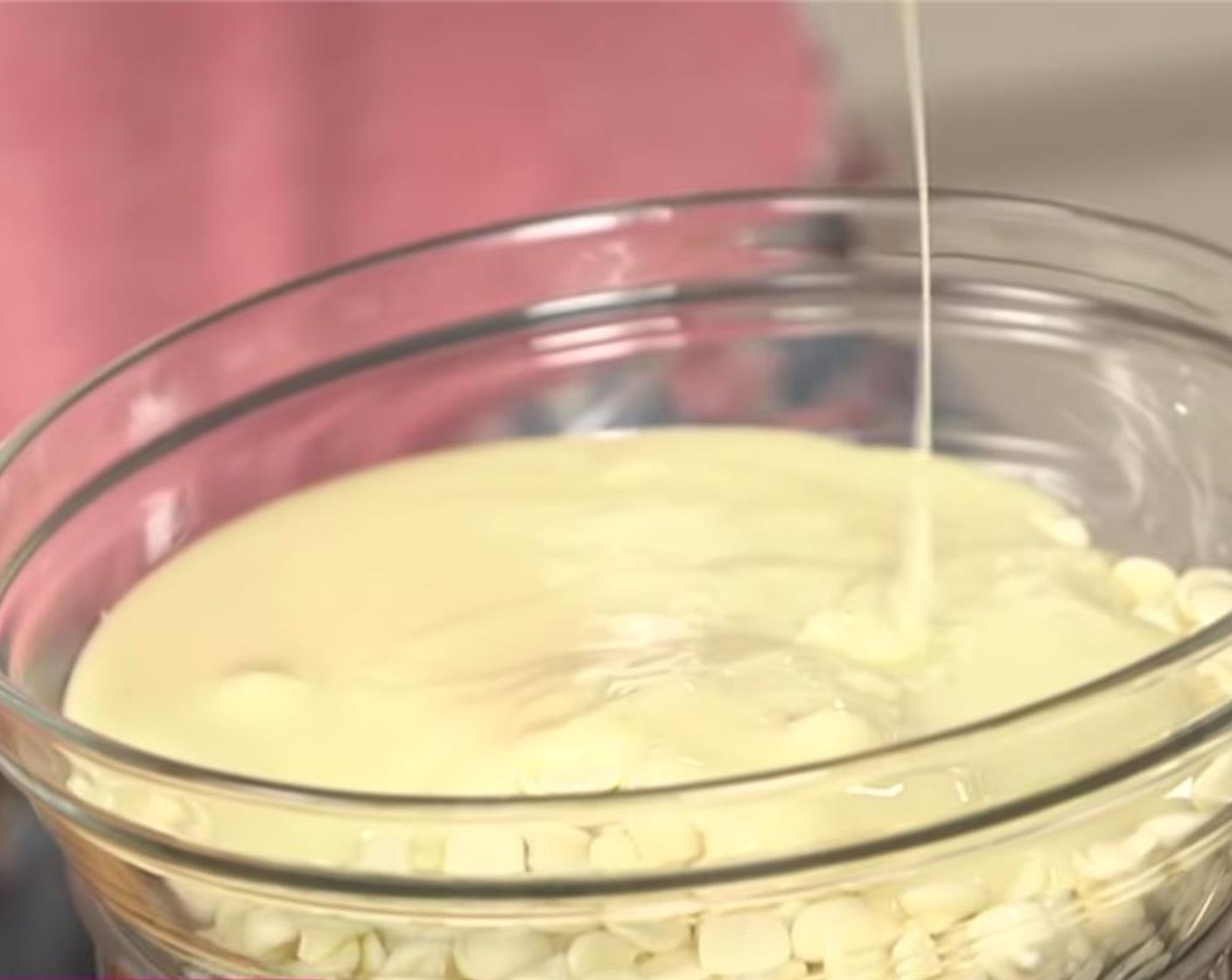 step 2 Fill a large saucepan with about an inch of water; set a large heatproof mixing bowl on top, and add the White Chocolate Chips (3 1/2 cups) and Sweetened Condensed Milk (1 1/3 cups).