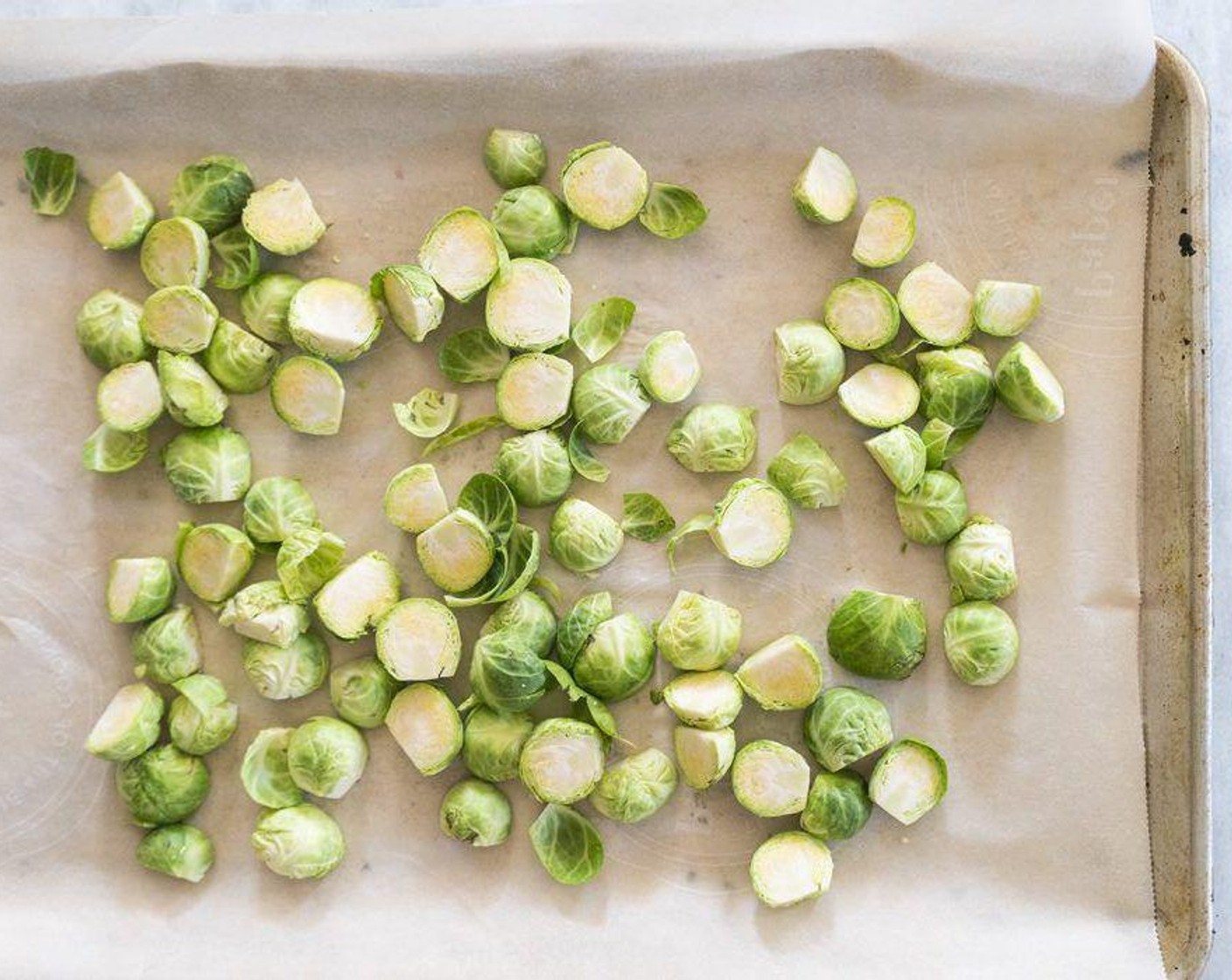 step 2 Cut Brussels Sprouts (7 1/2 cups) in half.