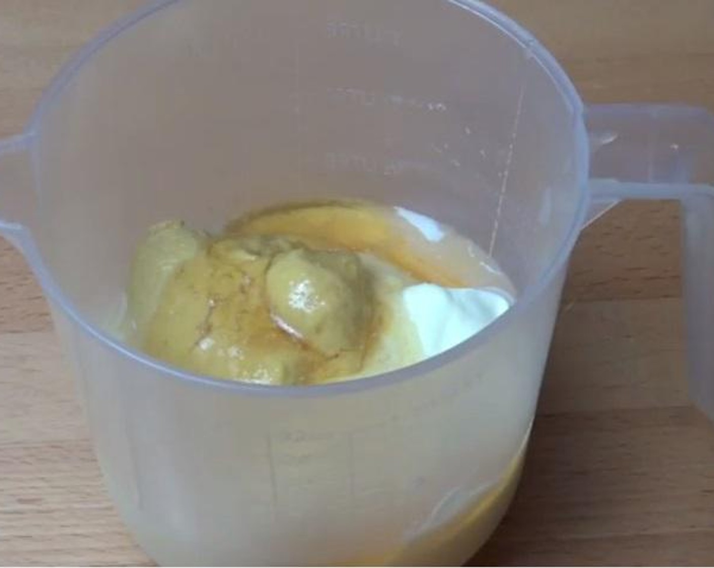 step 2 In a small jug, mix together the Mayonnaise (1 cup), Sour Cream (1/2 cup) ,Dijon Mustard (1 Tbsp), juice from Lemon (1) and Honey (1 Tbsp). Season with Salt (to taste) and Ground Black Pepper (to taste).