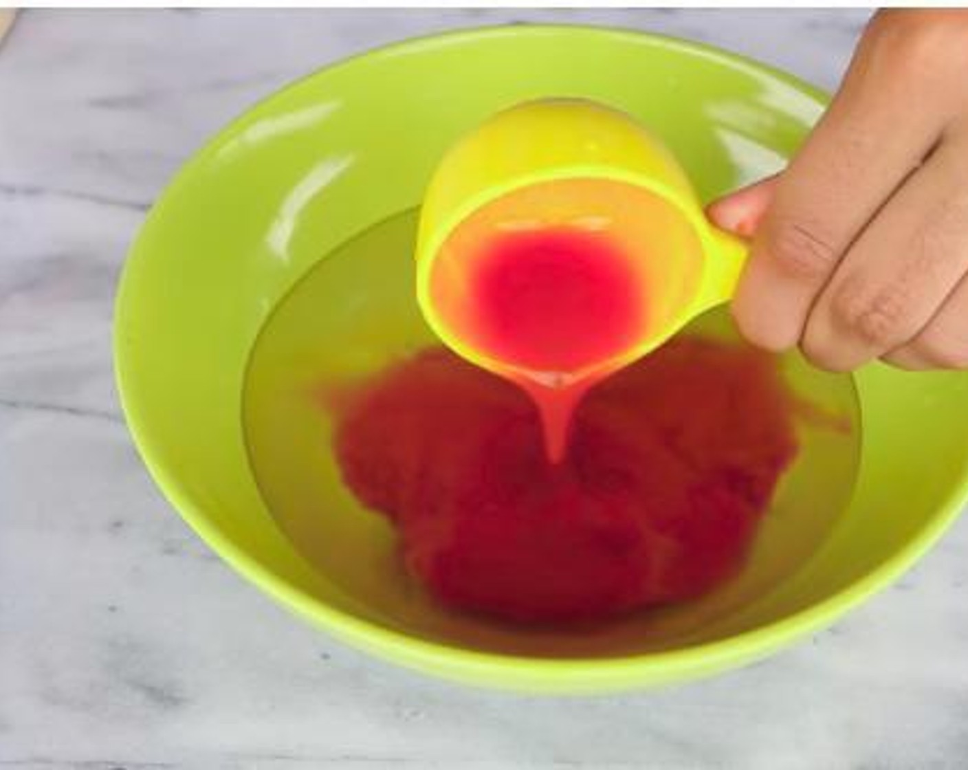 step 2 Inside a bowl, mix together the Water (2/3 cup), and the Frank's® RedHot® Sauce (1/3 cup).