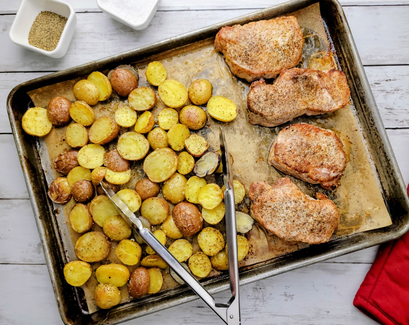 step 10 Remove the pork chops and potatoes from the oven and serve immediately. To serve, slice the pork chops and then smother them with the warm pan sauce. Serve with Iceberg Garden Salad (4 3/4 cups).