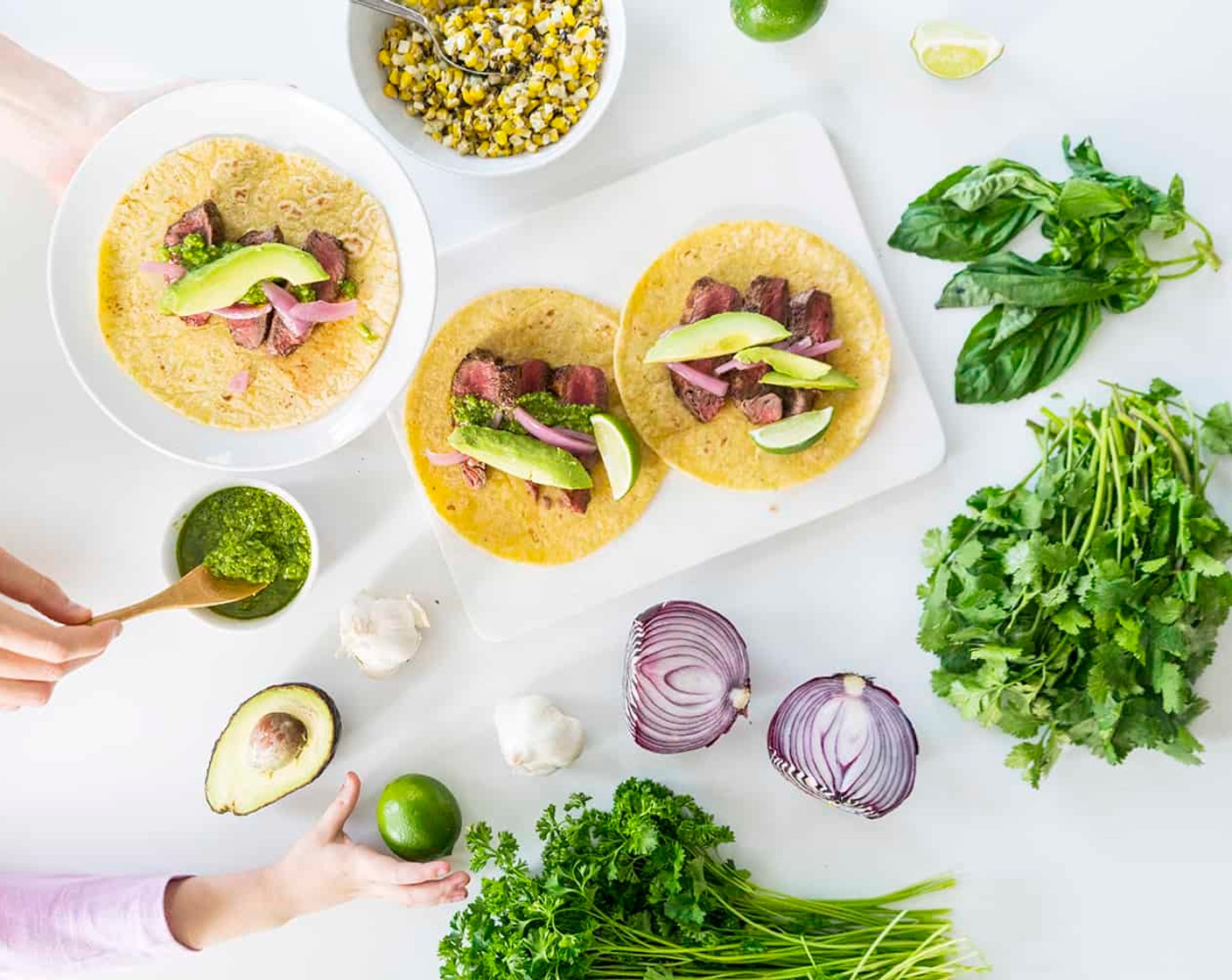 step 5 Assemble tacos with seared steak, sliced Avocados (to taste), Pickled Red Onions (to taste), chimichurri sauce, Limes (to taste) and Corn (to taste).