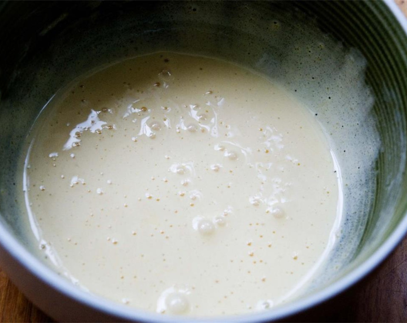 step 2 Meanwhile, separate the whole Eggs (3) into yolks and whites. Whisk the yolks with the Granulated Sugar (1/2 cup) until creamy.