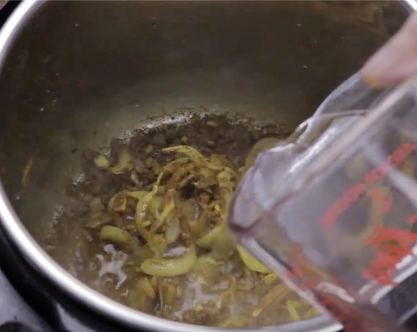 step 7 Add a bit of the Water (1 1/4 cups) and fully deglaze the pot. Add in the remaining cup of water.