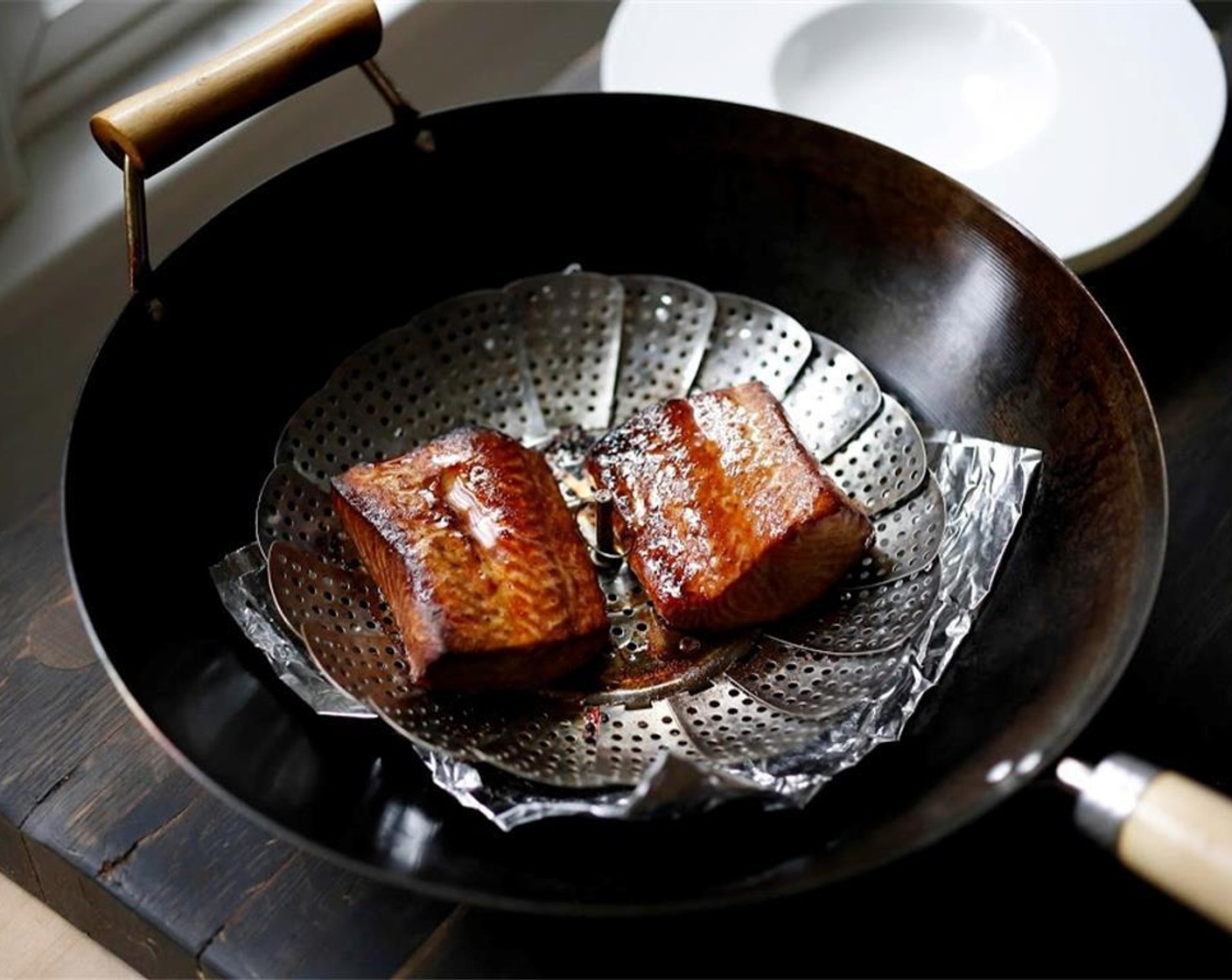 step 15 Then caramelize the top of the salmon by either placing under the broiler for a minute or two, or use a chef’s torch, and set aside or in a warm oven.