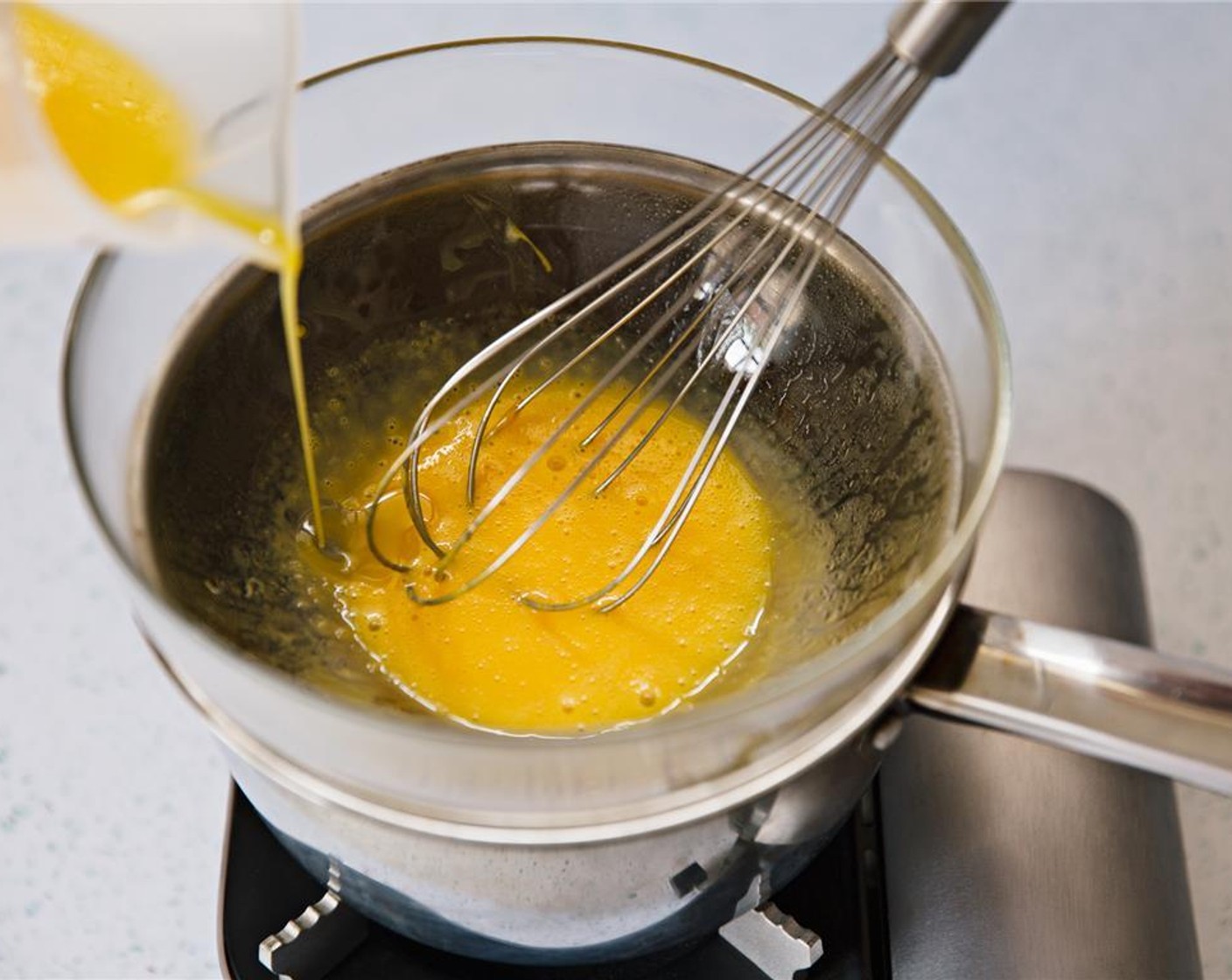 step 7 Slowly add melted unsalted butter, whisking constantly.