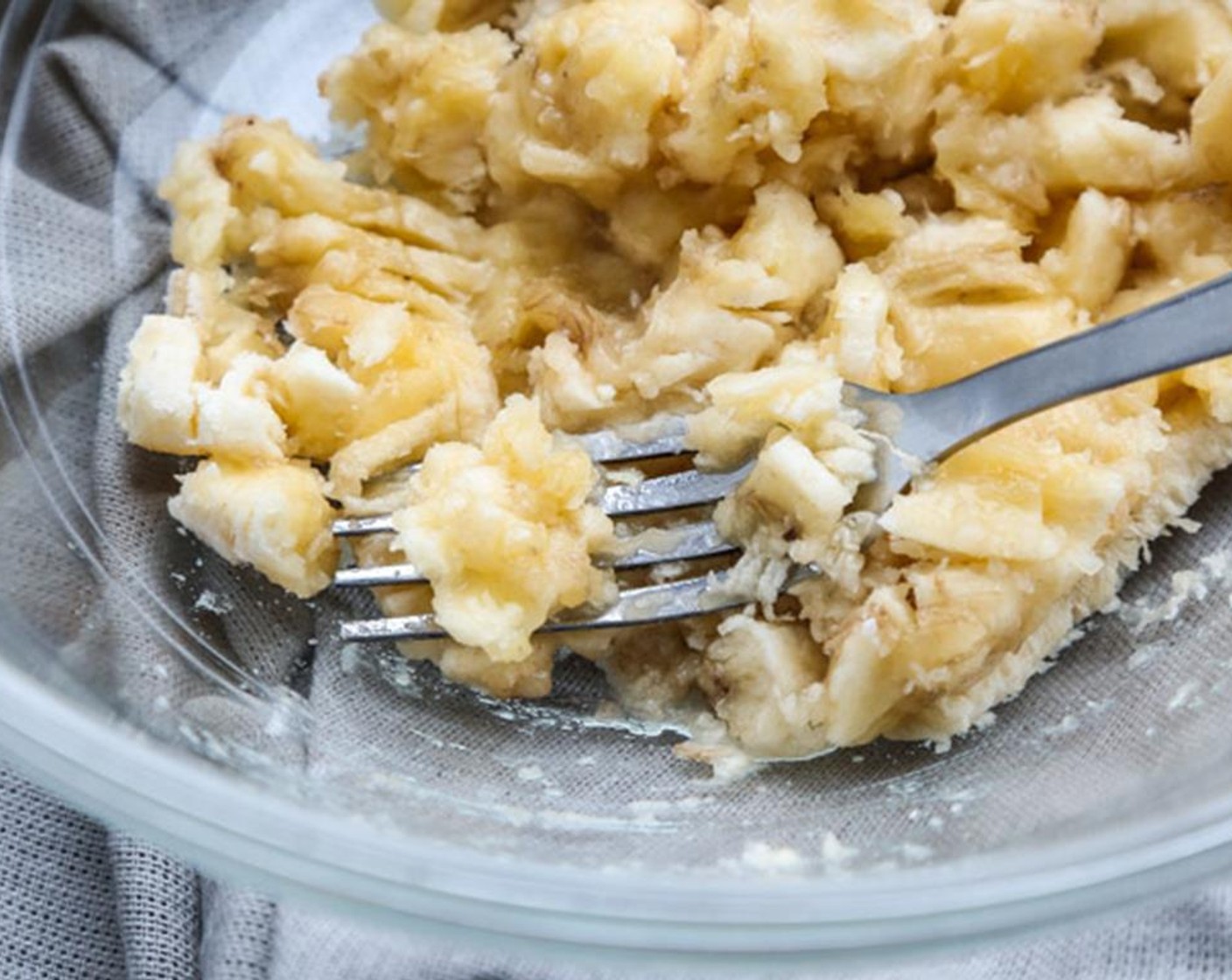 step 2 In a large mixing bowl, combine the Banana (1 cup), Almond Milk (1 cup), Maple Syrup (1/4 cup), Creamy Peanut Butter (1/4 cup), and Egg (1). Whisk until smooth.