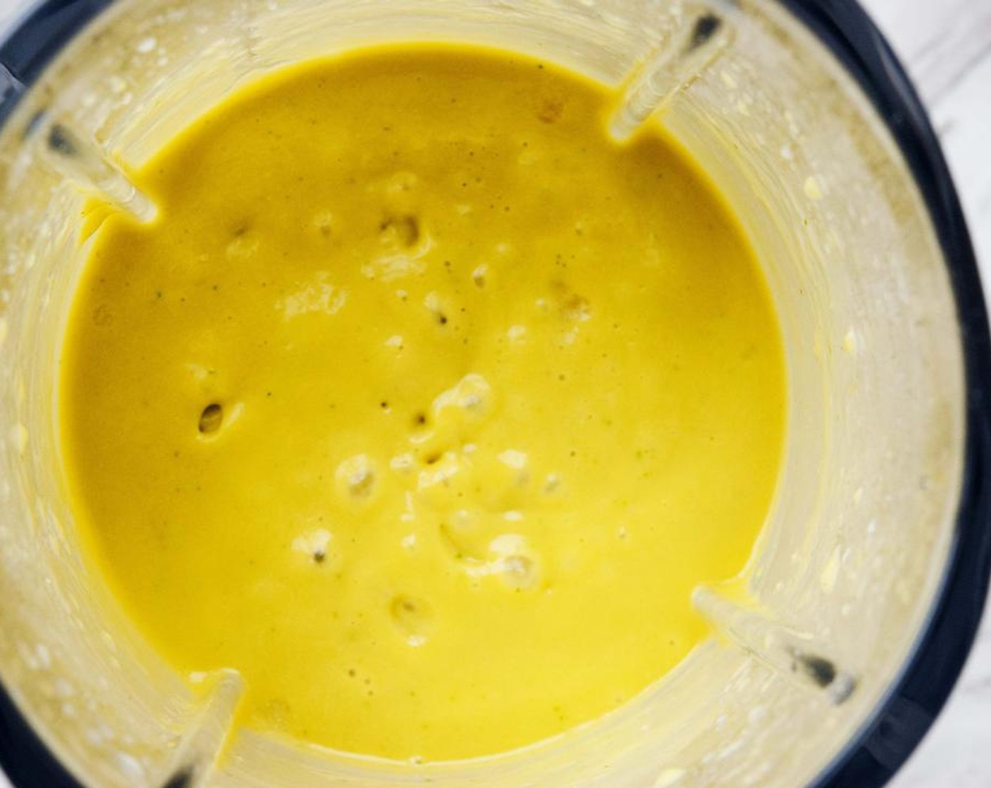 step 1 Add Avocado (1/2), Full-Fat Coconut Milk (1/3 cup), Mango (1 cup), juice from Lime (1/2), Coconut Water (3/4 cup), Vodka (4 fl oz), and Ice (1 cup) to a blender and blend until completely smooth. Taste for flavor and add more coconut water or vodka if needed.