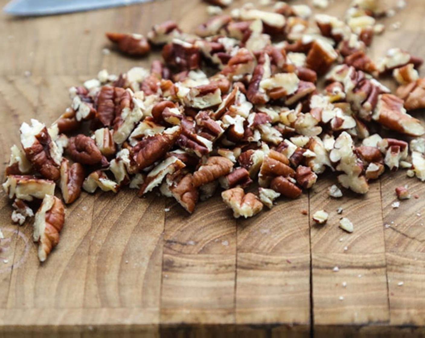 step 2 In a medium mixing bowl, combine the Oat Flour (1 cup), Almond Meal (1/3 cup), Gluten-Free Baking Powder (1/2 Tbsp), Sea Salt (1/4 tsp), and Xanthan Gum (1/4 tsp). Whisk together with a fork until incorporated. Add the Pecans (1/3 cup).