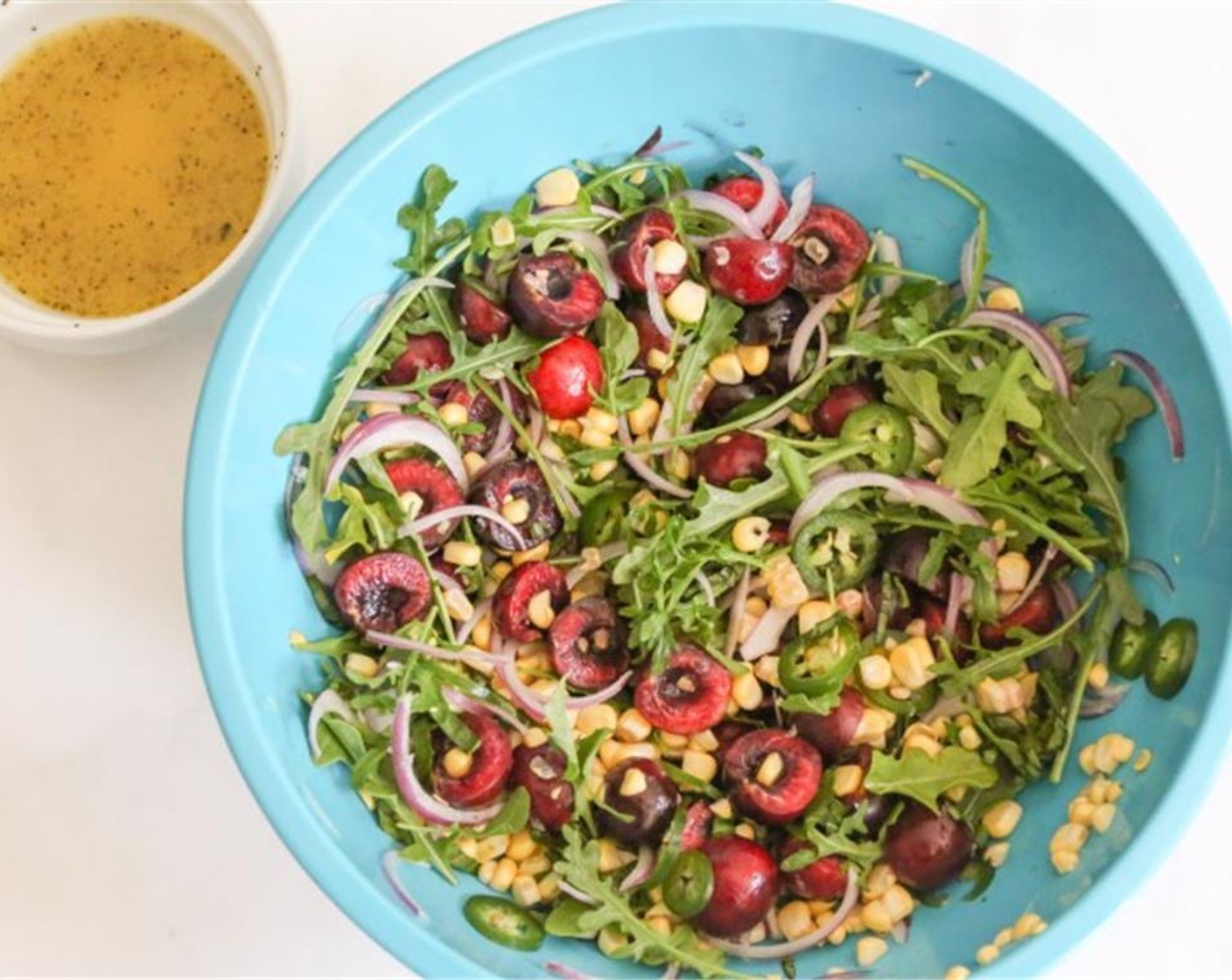 step 5 Add the salad dressing and toss again. Allow the salad to rest for 10 minutes before serving. Meanwhile, heat a lightly oiled grilled or grill pan over medium-high heat.