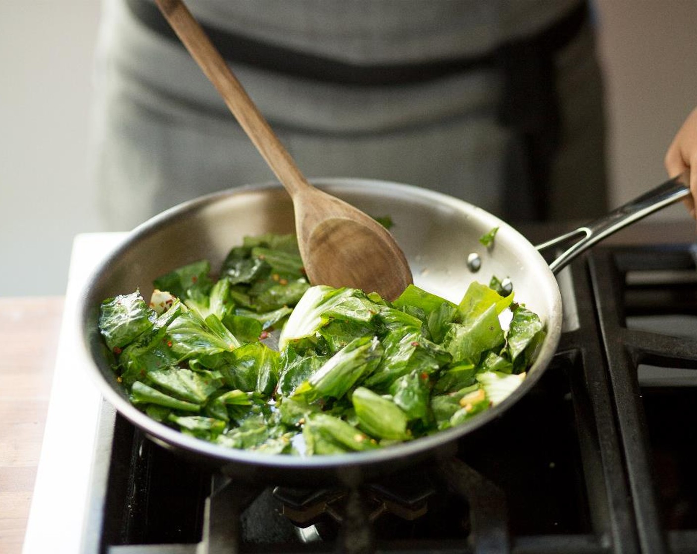 step 11 Stir in escarole; season with Crushed Red Pepper Flakes (1/4 tsp) and Salt (1/4 tsp). Cook, stirring frequently until tender, about 5 minutes.