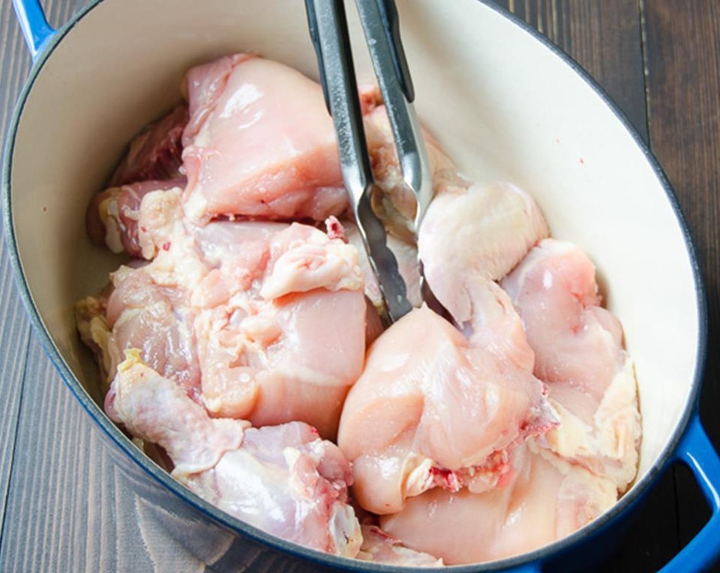 step 1 Remove skin and excess fat from Whole Chickens (4 lb) pieces and transfer to a large dutch oven.
