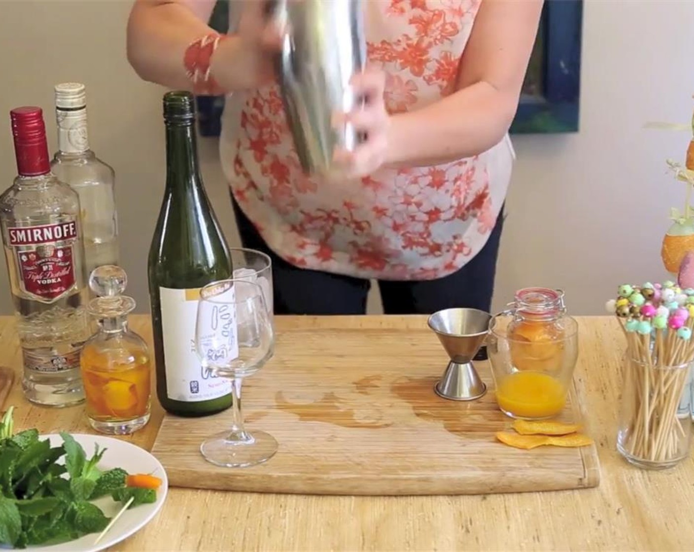 step 2 Pour Orange Vodka (1 fl oz), Whipped Cream Vodka (0.5 fl oz), Nigori Unfiltered Sake (2 fl oz) and Oranges (1 1/4) into a shaker tin. Add some Ice (to taste) and shake for about 10 seconds until frosty.