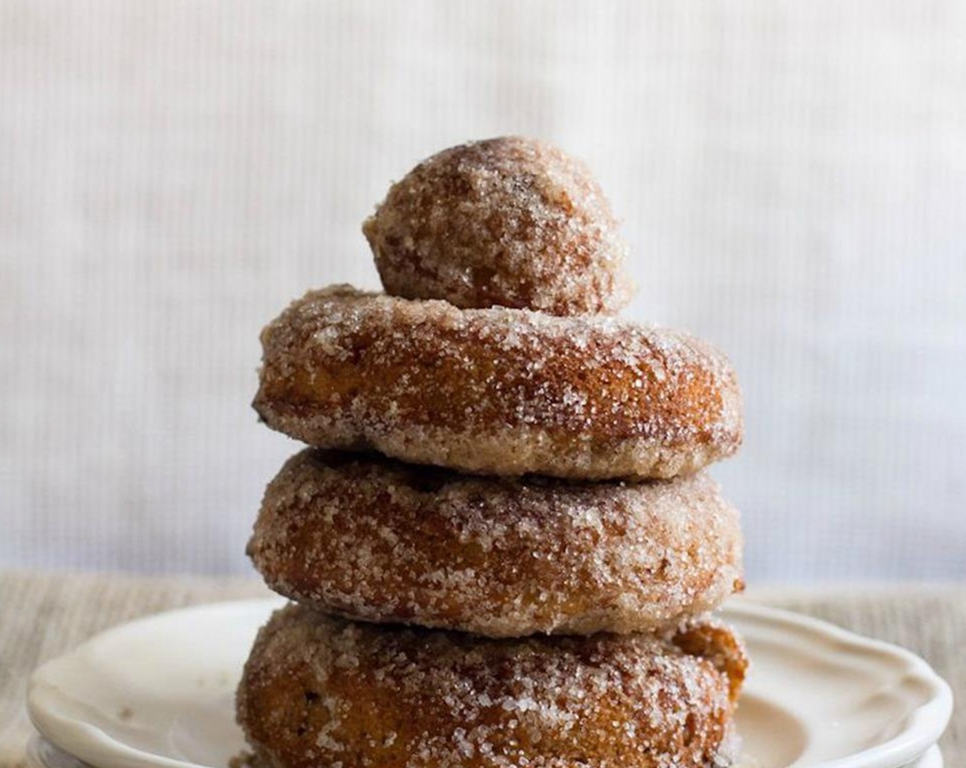 step 16 As the doughnuts cool they will firm and form a crunchy outer coating. Serve warm.