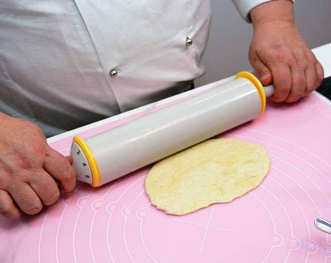 step 7 Take a piece of the dough and roll it out with a rolling pin.