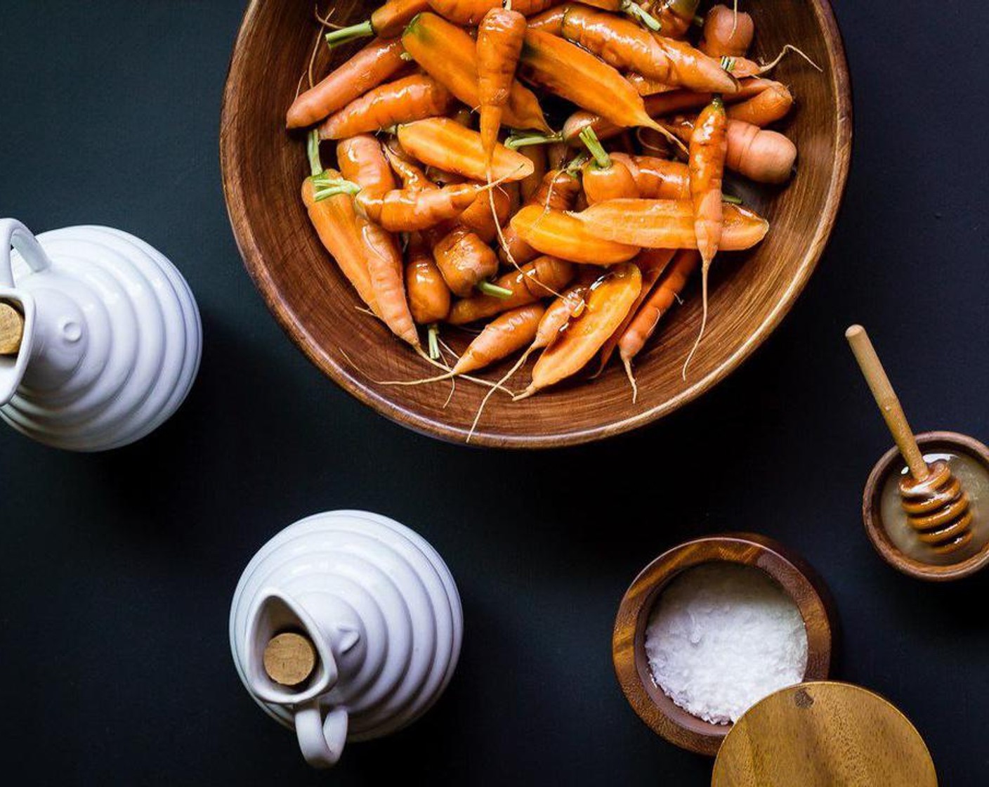 step 3 Place prepared carrots in a bowl and drizzle carrots with Olive Oil (2 Tbsp), Balsamic Vinegar (1 Tbsp), and Honey (1 Tbsp), tossing to coat.