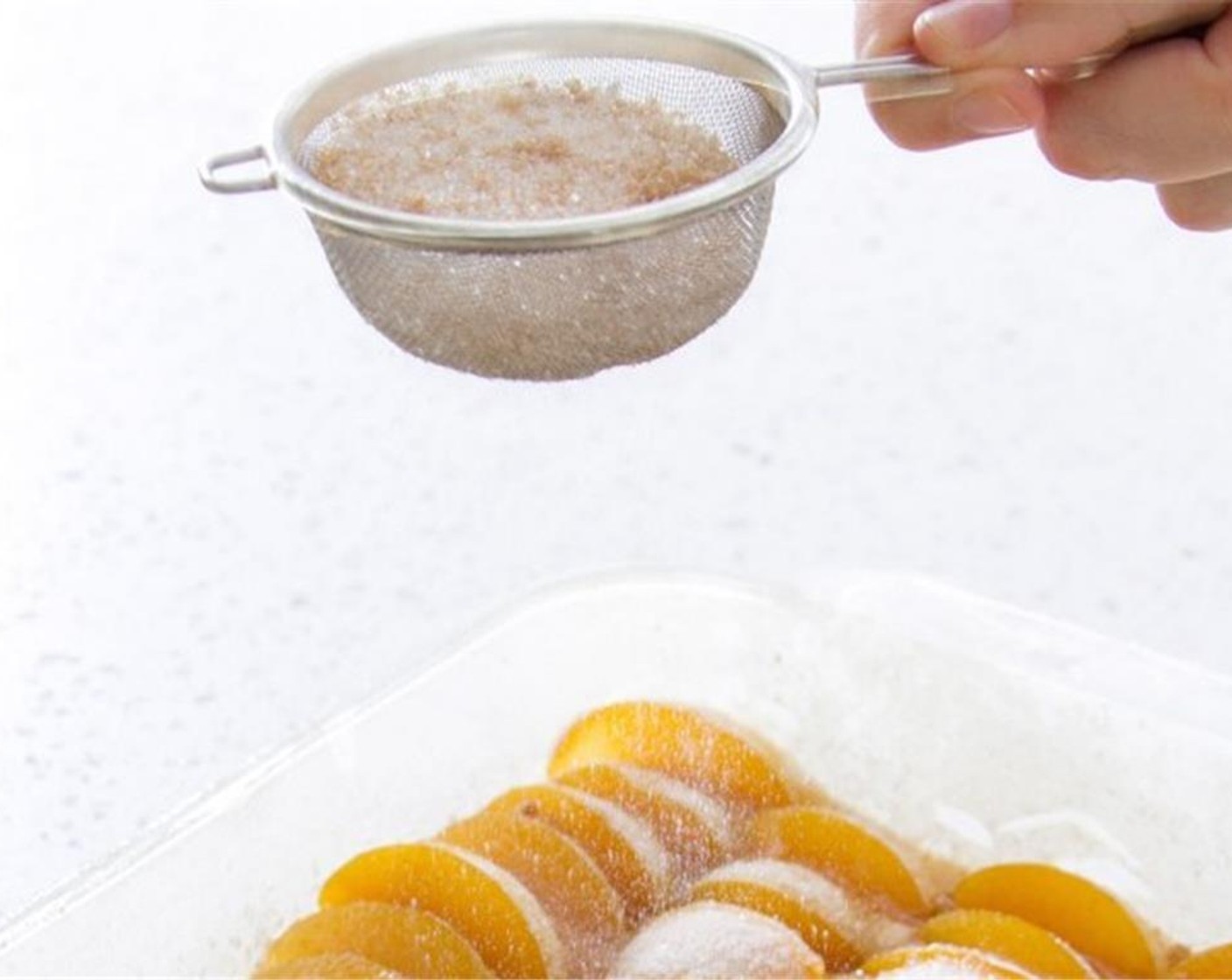 step 6 Arrange plums in rows on top of dough. Squeeze in as many plums as possible. Combine Granulated Sugar (2 Tbsp) and Simply Organic Cinnamon, Ground (1/2 tsp) and then sprinkle over the plums. Dab with remaining chilled Butter (3 Tbsp)