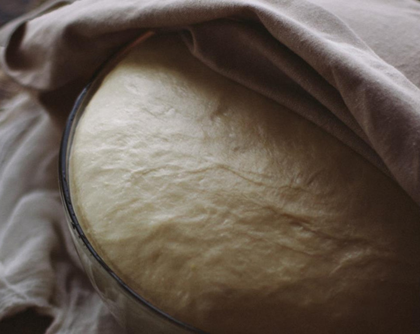 step 4 Transfer the dough onto a lightly floured kitchen counter and knead with your hands for 15 minutes.