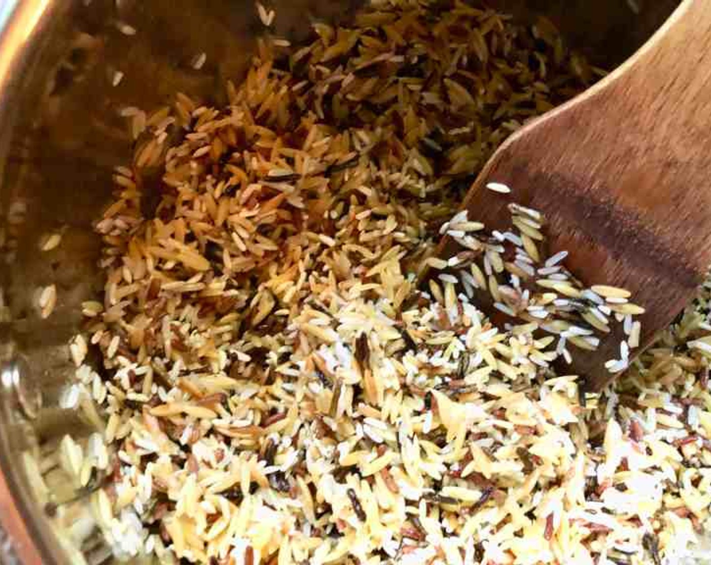 step 2 Add Wild Rice (1 1/2 cups) and toast for another 2 minutes, stirring often.