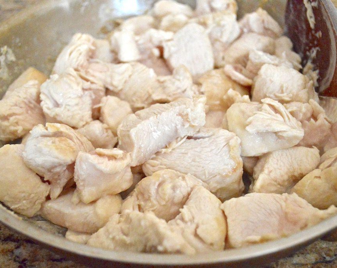 step 1 First, mix the Boneless, Skinless Chicken Breasts (2 lb) and Corn Starch (2 Tbsp) in a bowl so that the chicken gets coated.
