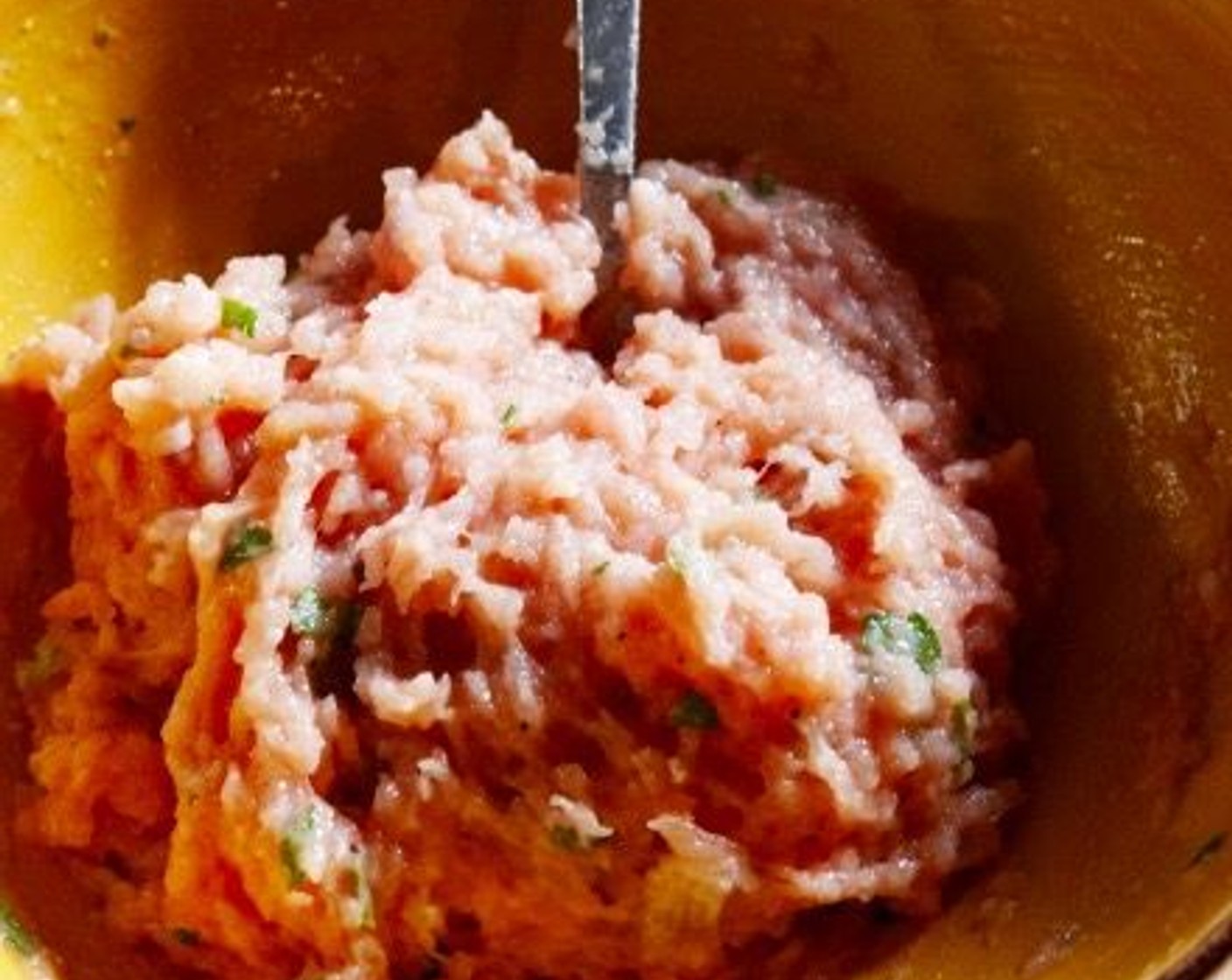 step 4 In a large bowl, combine Ground Turkey (10.5 oz), Yellow Onions (4 Tbsp), Eggland's Best Classic Egg (1), Tapioca Starch (1 Tbsp), Fresh Rosemary (1 Tbsp) Simply Organic Garlic Powder (1 tsp), and Sea Salt (1/2 tsp). Mix well.