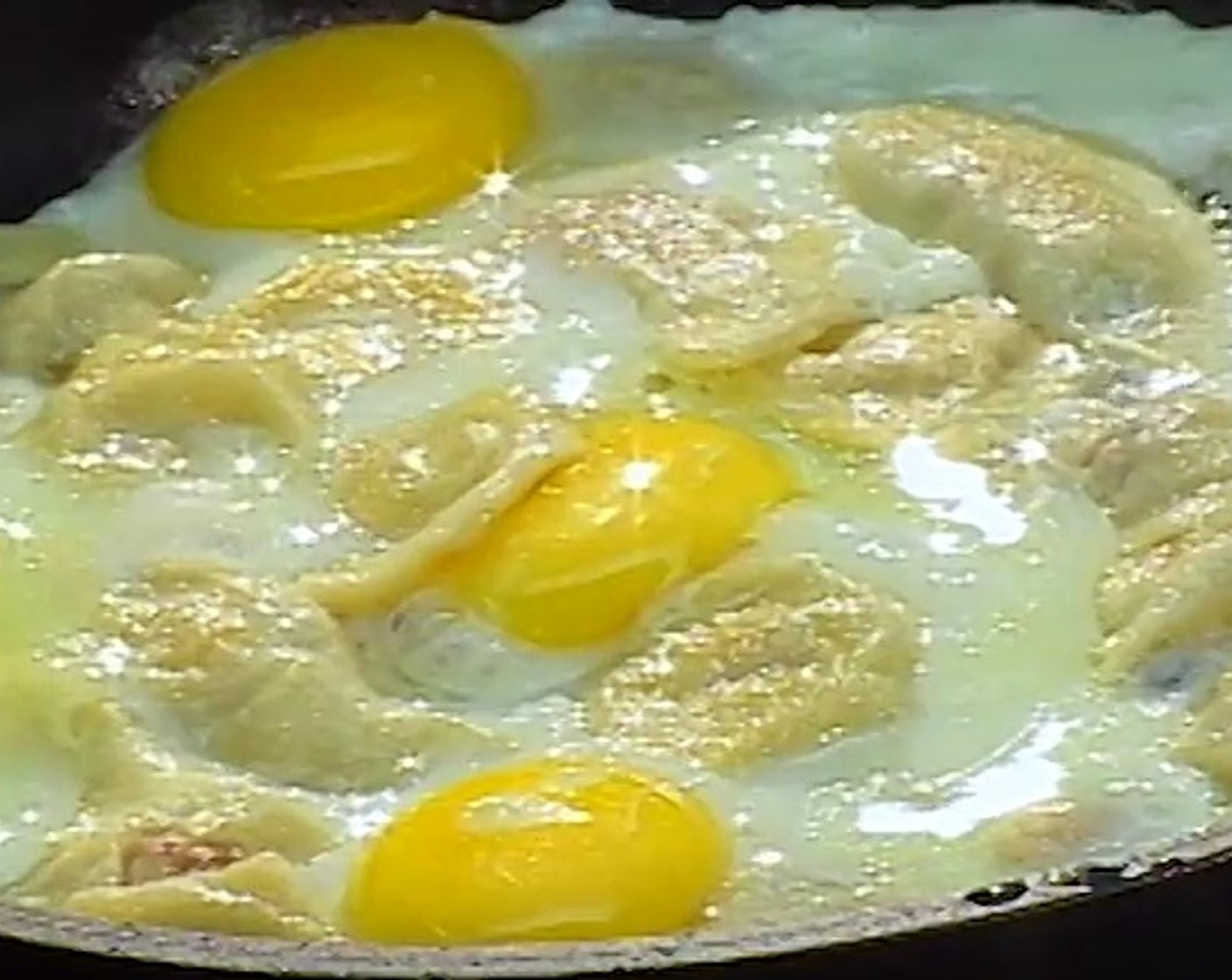 step 8 Put some Vegetable Oil (1 Tbsp) on the frying pan and fry the dumplings. You can add some eggs to the frying pan.