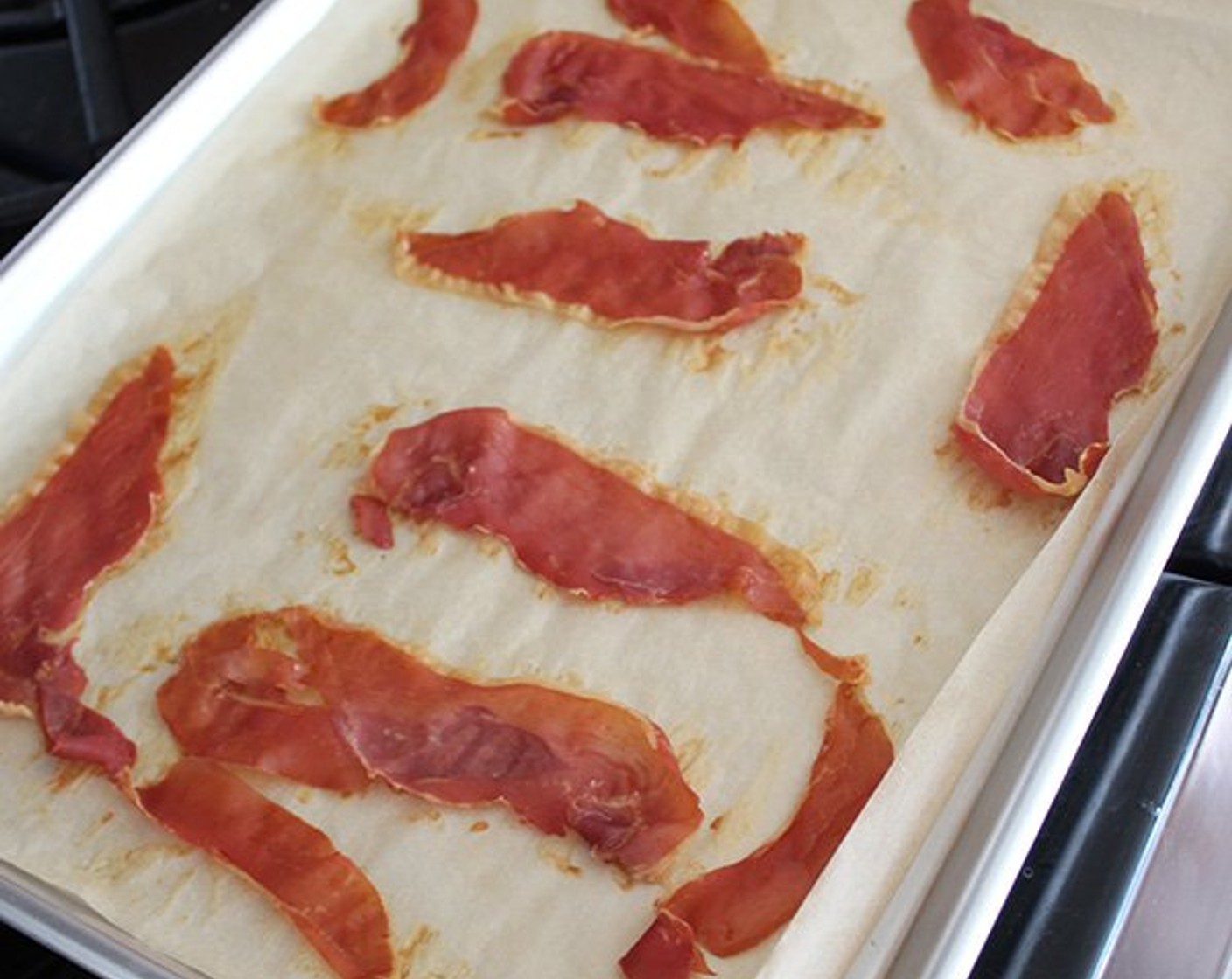 step 2 Lay the slices of Prosciutto (2 oz) in a single layer on the pan and roast for 8-10 minutes, until browned. Set aside to cool, then break into small pieces.