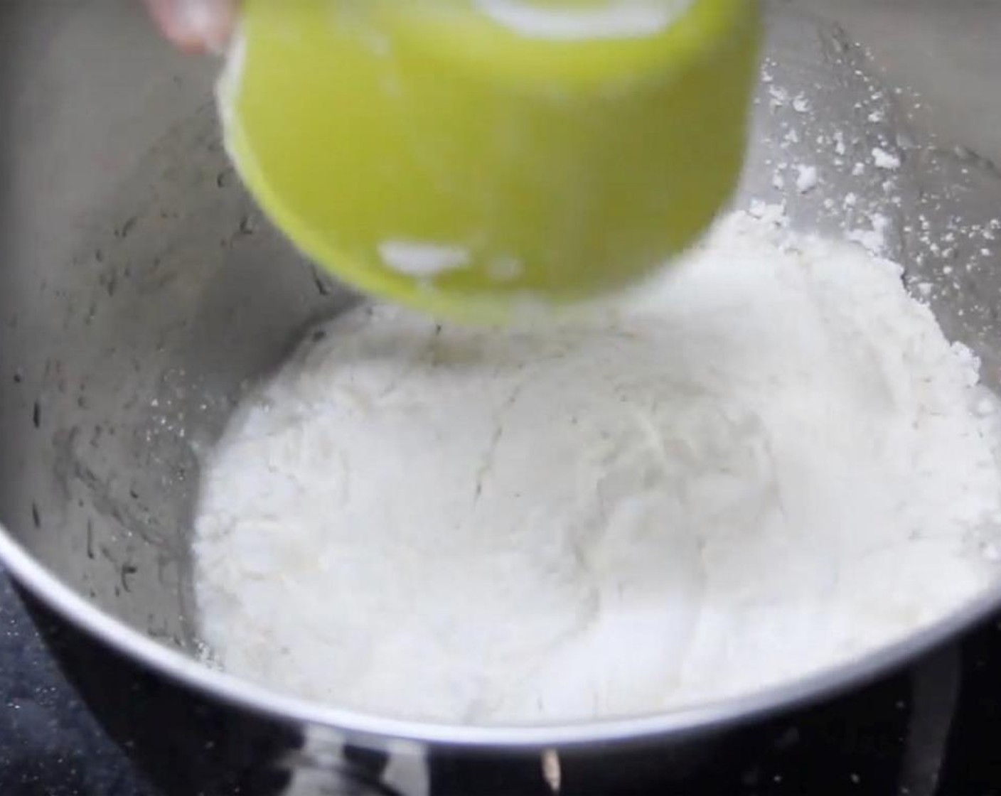 step 2 Then, add in Salt (1 tsp), Oil (2 Tbsp) and All-Purpose Flour (3 cups). Mix until combined.