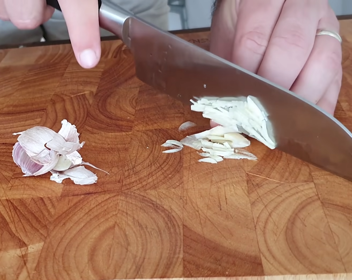 step 2 While you are waiting you can prepare all of your ingredients. Finely slice the Garlic (2 cloves) before cutting them into thin strips and then again into even smaller pieces.