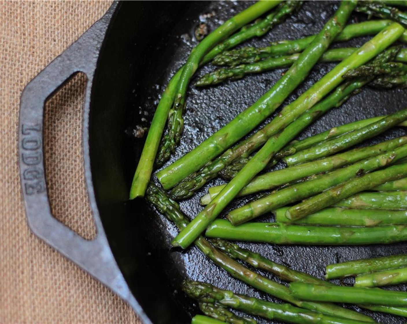 step 8 To the same skillet, still set over medium heat, add the Olive Oil (1/2 Tbsp) and the asparagus spears, season with kosher salt (to taste), and cook for 7 to 10 minutes, stirring occasionally, until the asparagus is tender.