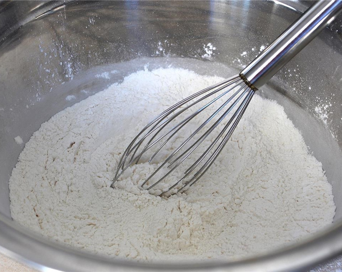 step 1 Preheat oven to 375 degrees F (190 degrees C). In a medium size bowl, mix the dry ingredients: All-Purpose Flour (2 cups), Salt (1/2 tsp) and Baking Soda (1/2 Tbsp) together.