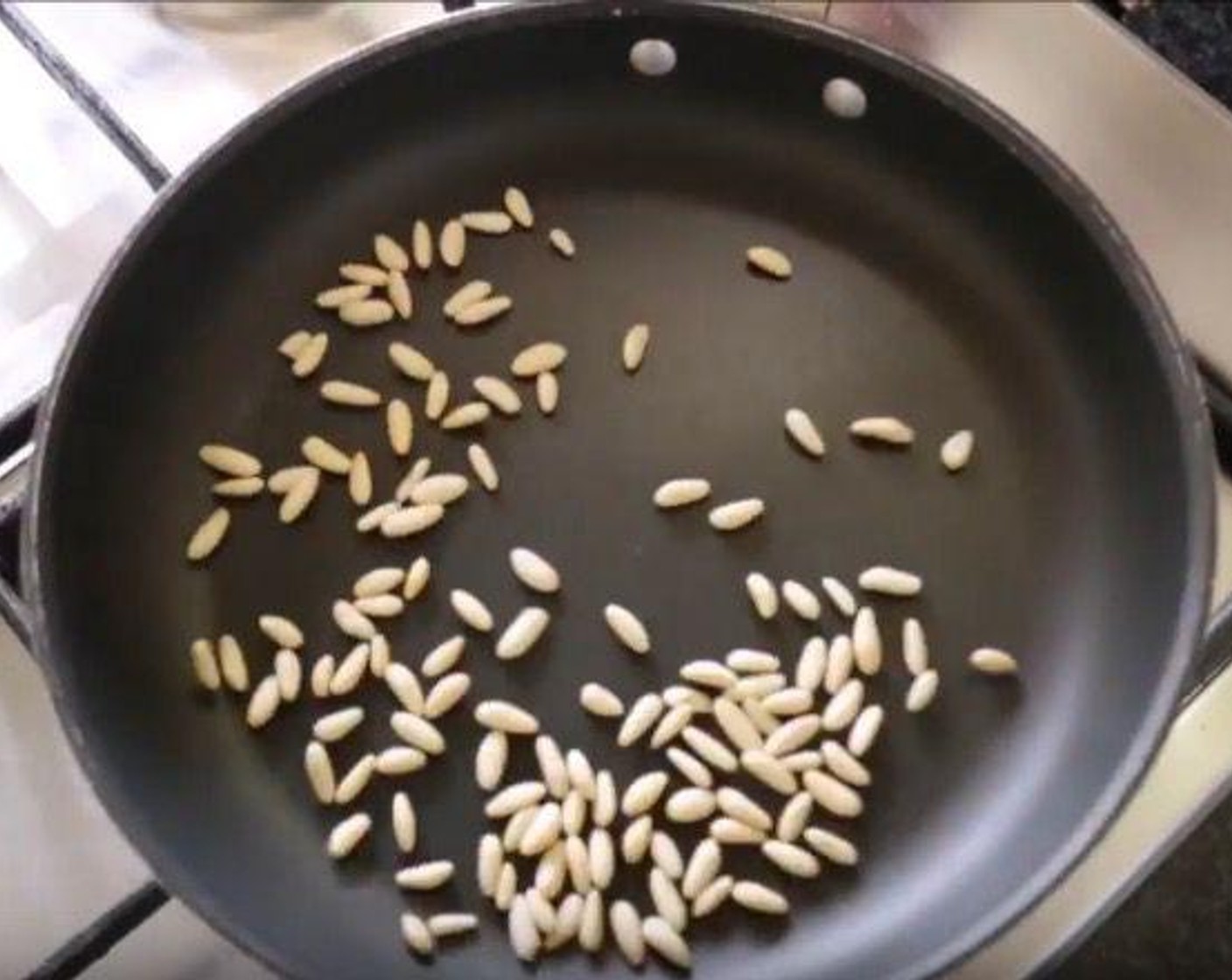 step 2 Heat a nonstick frying pan over a medium heat and dry roast Pine Nuts (2 Tbsp) for 4-5 minutes. Set aside.
