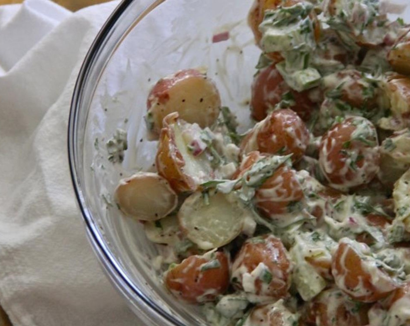 step 3 Once the potatoes are cooked, drain and set them aside to cool. Once cooled, add them to the mayo mixture bowl.