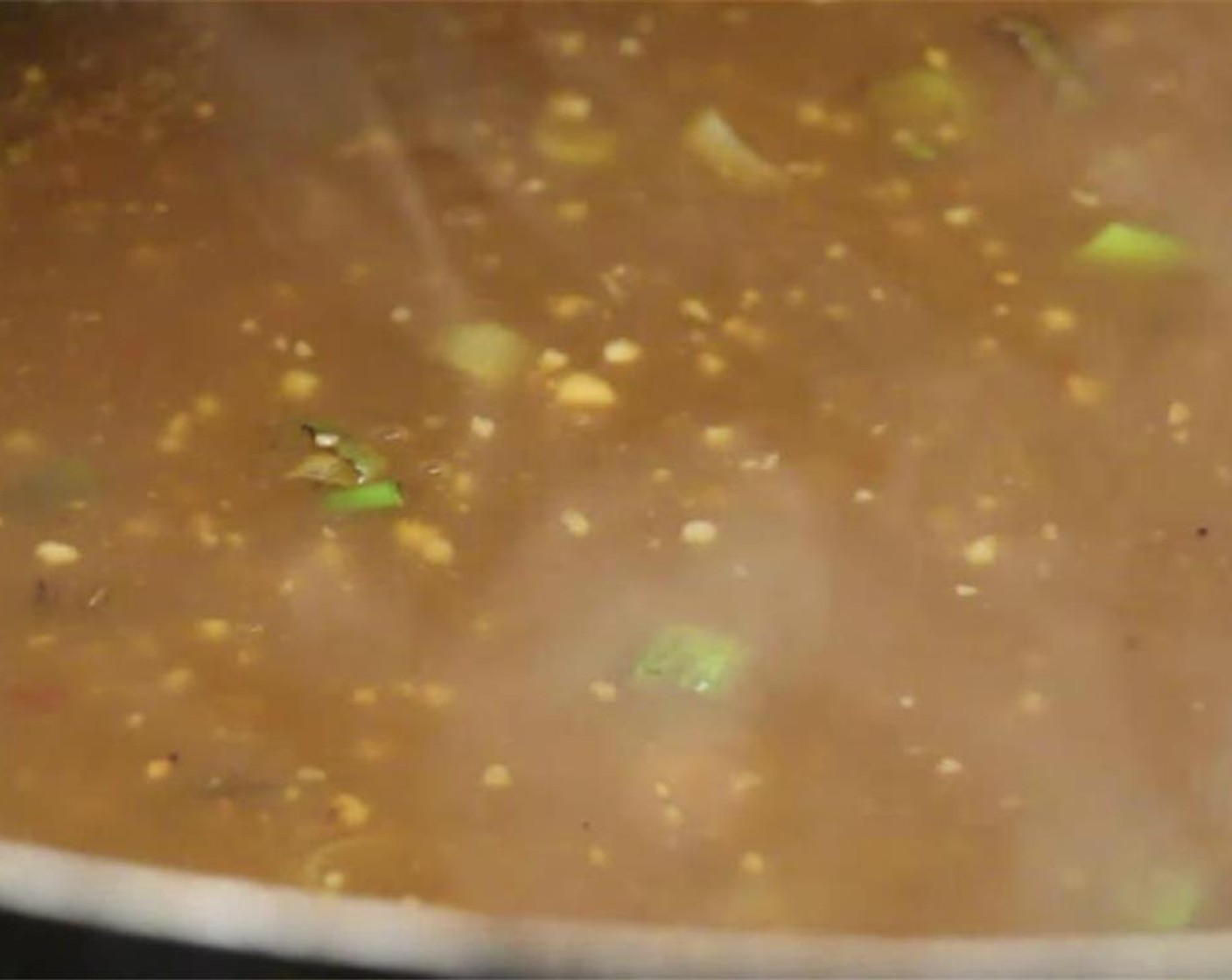 step 10 Add the orange sauce and the potato starch slurry.