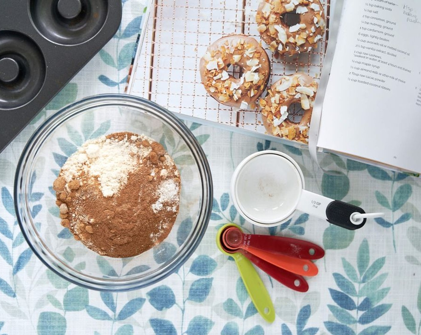 step 2 Sift Coconut Flour (1/2 cup) into a large bowl before whisking in Coconut Sugar (1/2 cup), Ground Cinnamon (1/2 Tbsp), Cream of Tartar (1 tsp), Baking Soda (1 tsp), Ground Cardamom (1 tsp), Ground Nutmeg (1/4 tsp), and Salt (1/4 tsp).