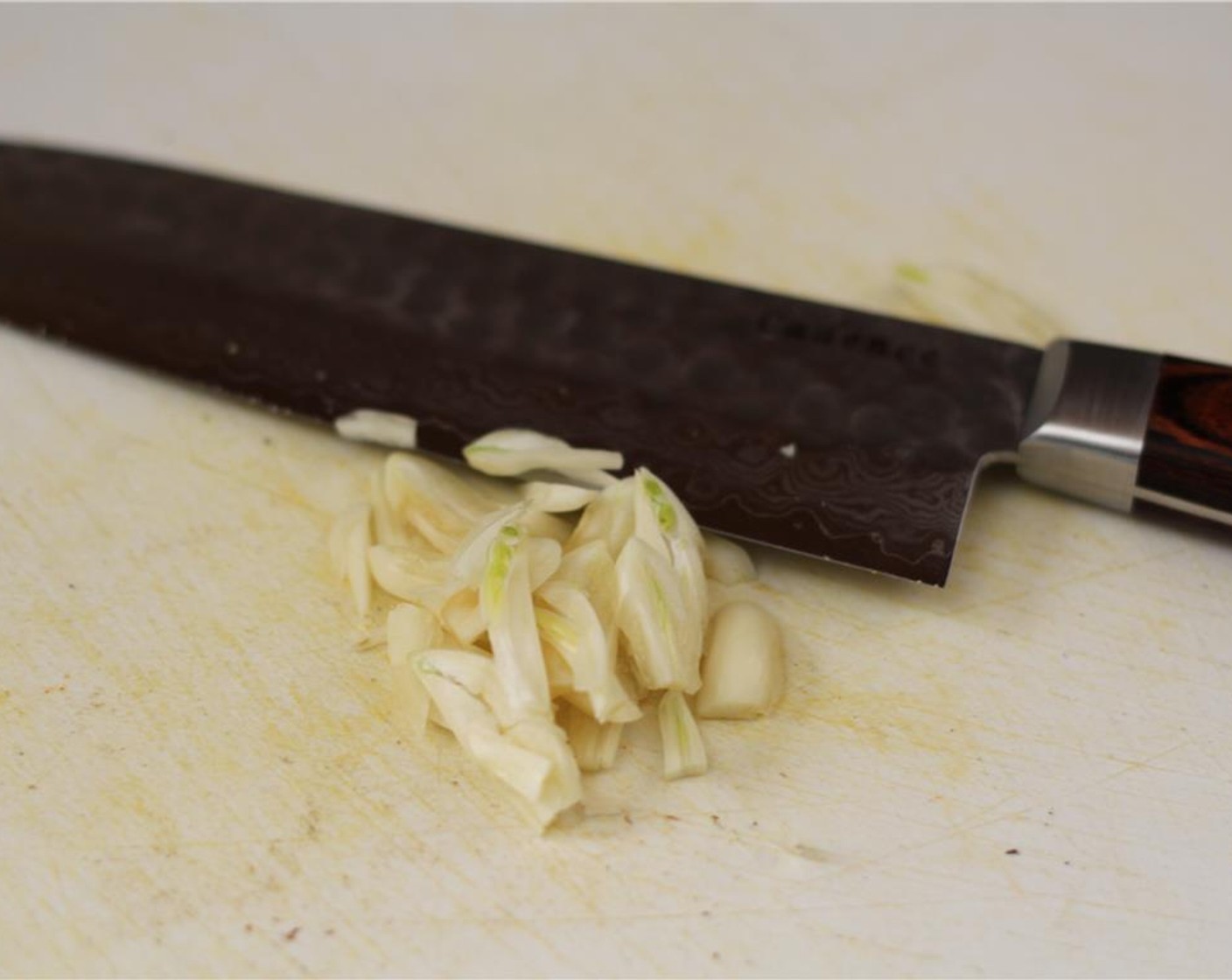 step 4 Slice the Garlic (3 cloves).