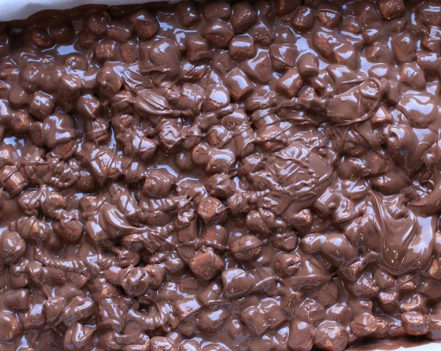 step 5 Pour mixture evenly into prepared baking pan – don’t press down too hard – you don’t want to squish the marshmallows!