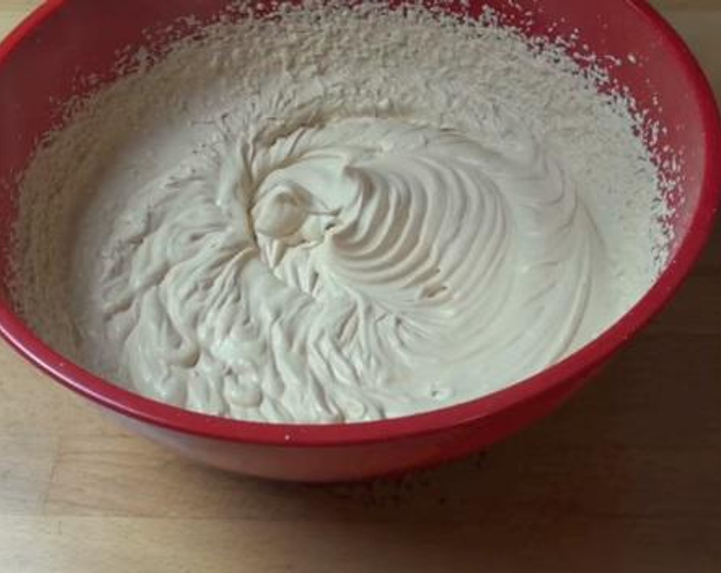 step 3 Into a large mixing bowl, add the Whipping Cream (2 1/2 cups),and coffee mixture. Combine everything using the electric mixer.