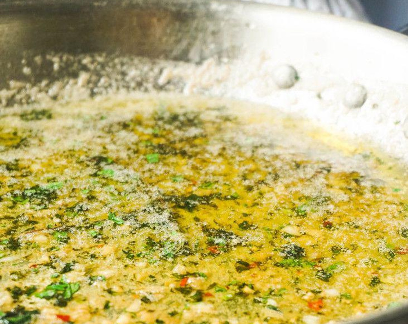 step 5 Add a squeeze of the other lemon half, splash of Dry White Wine (4 Tbsp), and the Fresh Parsley (2 Tbsp). Season with Ground Black Pepper (to taste).