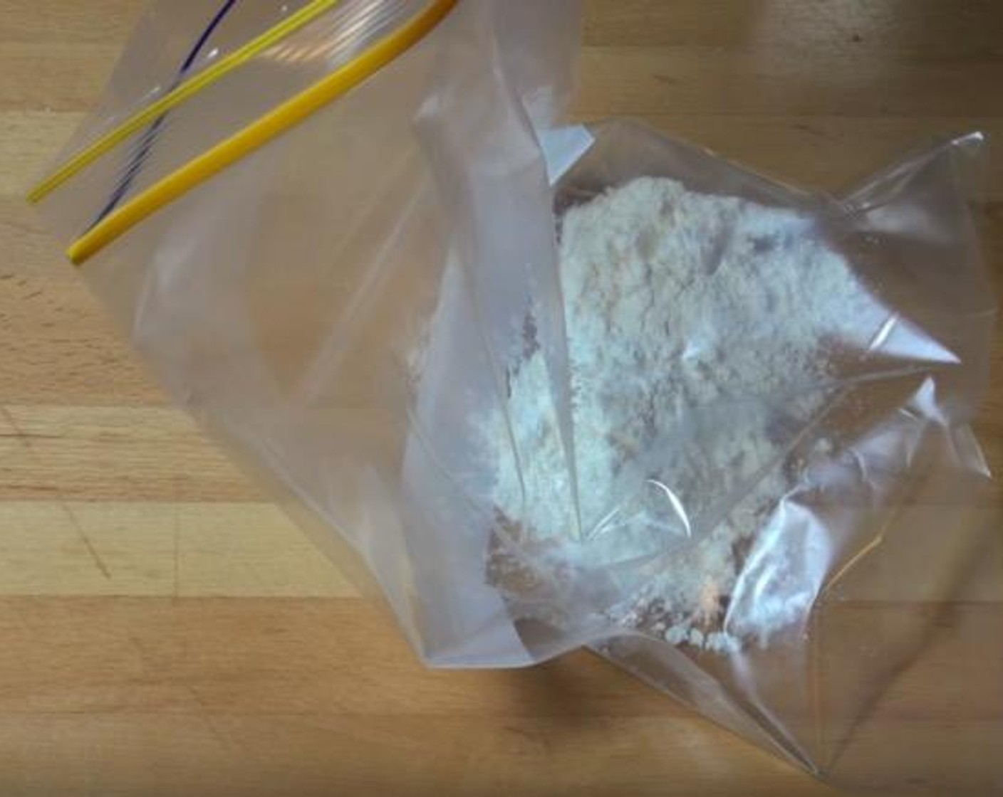 step 2 In a Ziploc freezer bag, add All-Purpose Flour (4 Tbsp), Corn Flour (2 Tbsp), Salt (to taste) and Ground Black Pepper (to taste), Simply Organic Garlic Powder (1 tsp) and Chili Powder (1/2 tsp). Shake to mix.