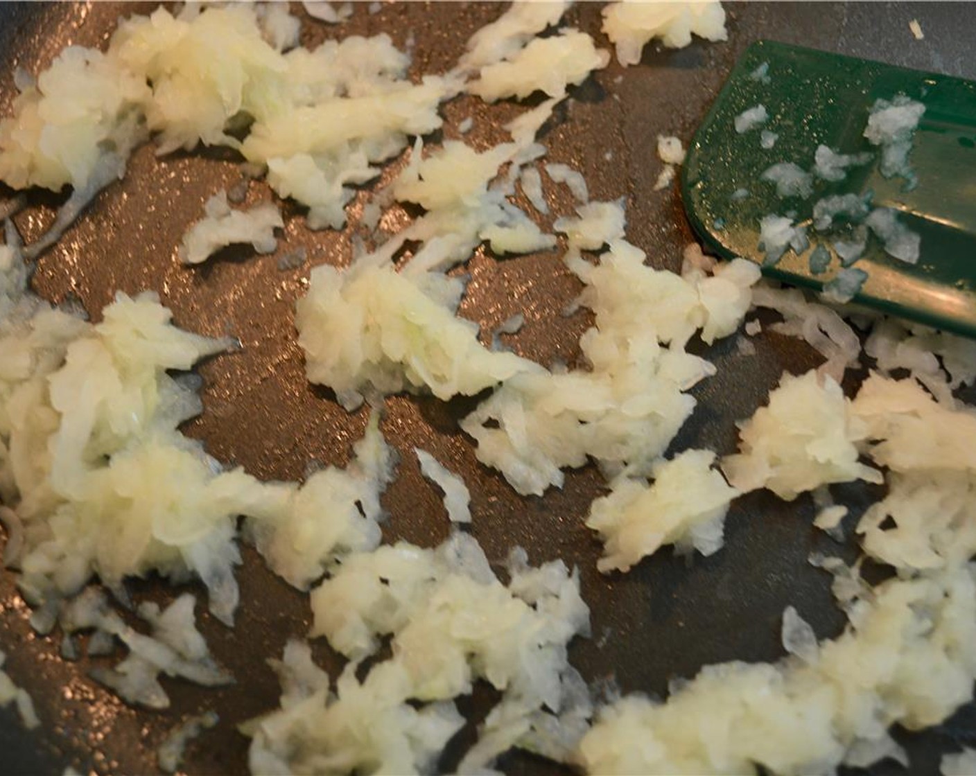 step 1 To make the filling, heat Extra-Virgin Olive Oil (1 tsp) in large saute pan. Add Onion (1) and cook until translucent, about 3 minutes.