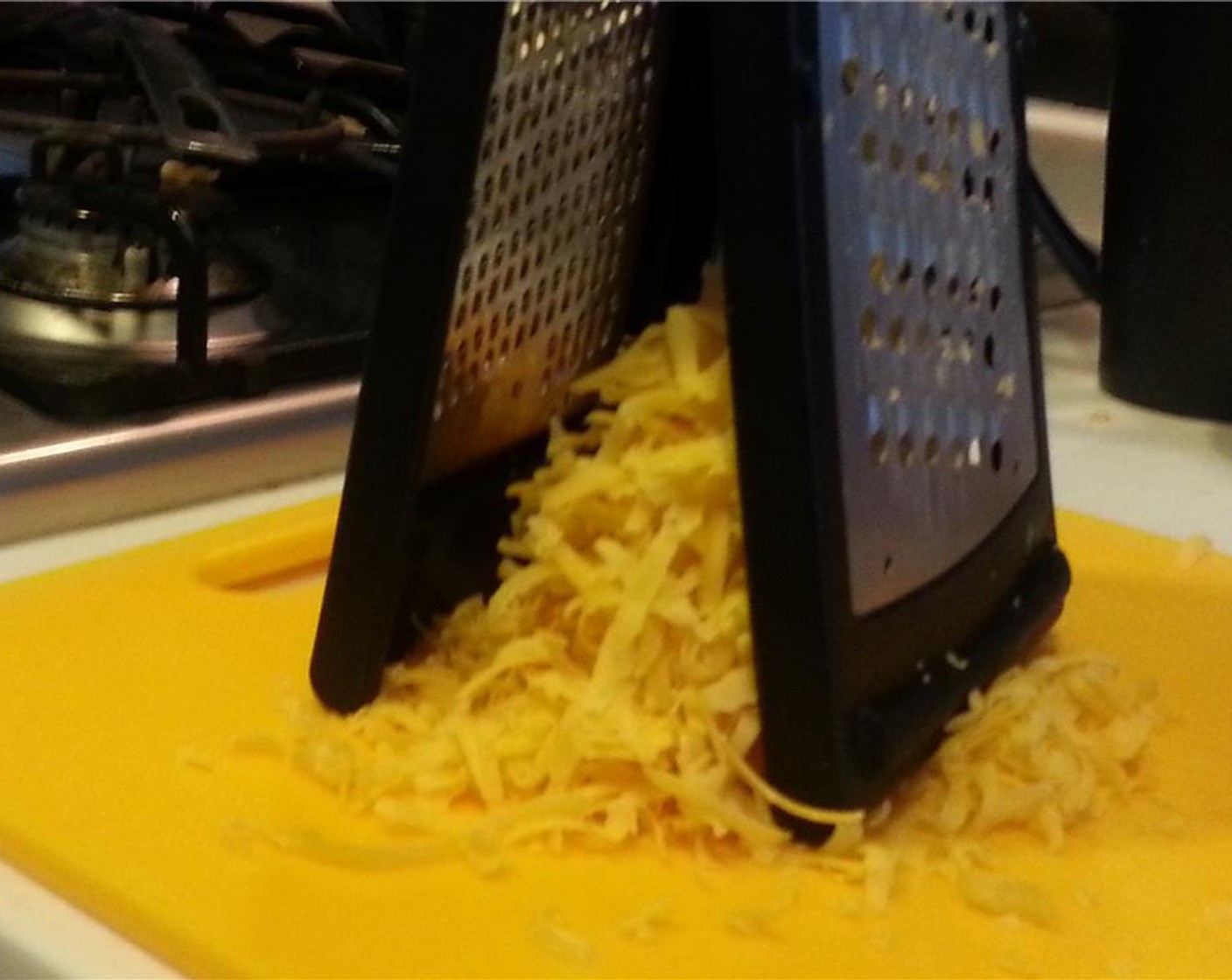 step 5 Grate up that brick of Sharp Cheddar Cheese (2 cups).