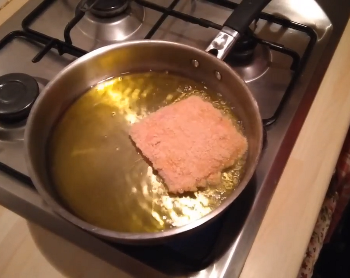 step 4 Fill a deep pan with a good amount of olive or sunflower oil. Once the oil is hot, fry them in small batches until golden brown on both sides, giving each sanjacobo at least 2-inches of space between them to avoid overcrowd and crumbling them.